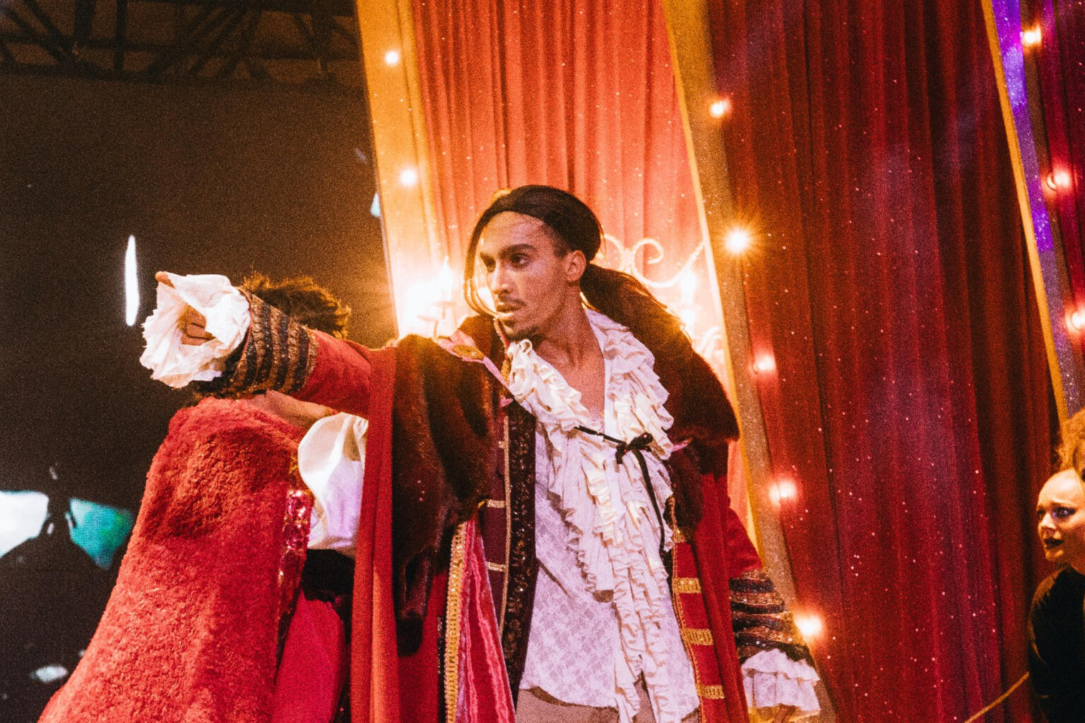 Dancers performing on stage, representing professional artist portfolios