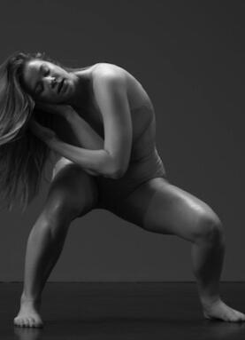 Dancers performing on stage, representing professional artist portfolios